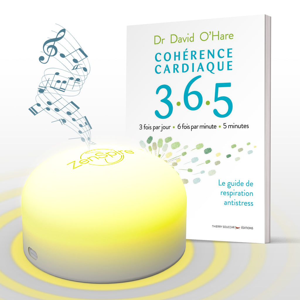 ZenSpire + allumé en jaune devant le livre Cohérence cardiaque 3.6.5 du Dr David O’Hare