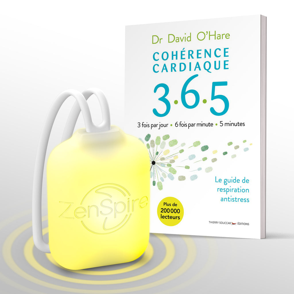 ZenSpire Pocket allumé en jaune devant le livre Cohérence cardiaque 3.6.5 du Dr David O’Hare