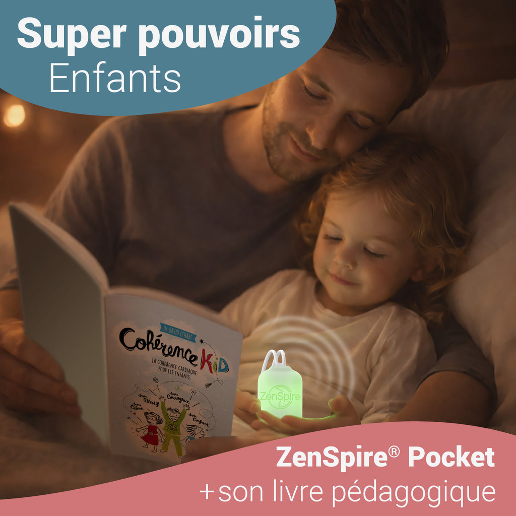 Un père lit le livre Cohérence Kid à son enfant, un ZenSpire Pocket allumé en vert près d’eux