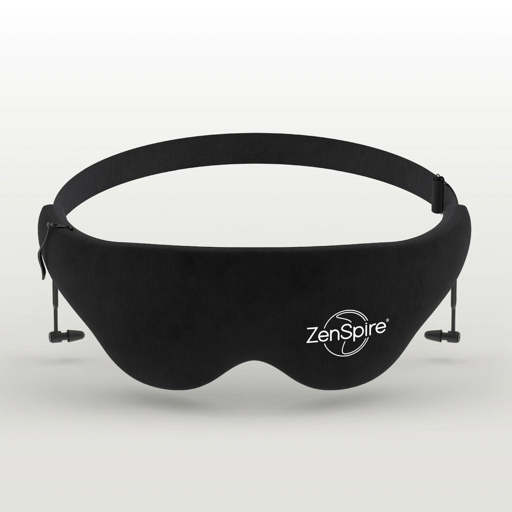 Masque de sommeil noir ZenSpire avec bouchons d'oreilles, vu de face sur un fond gris clair
